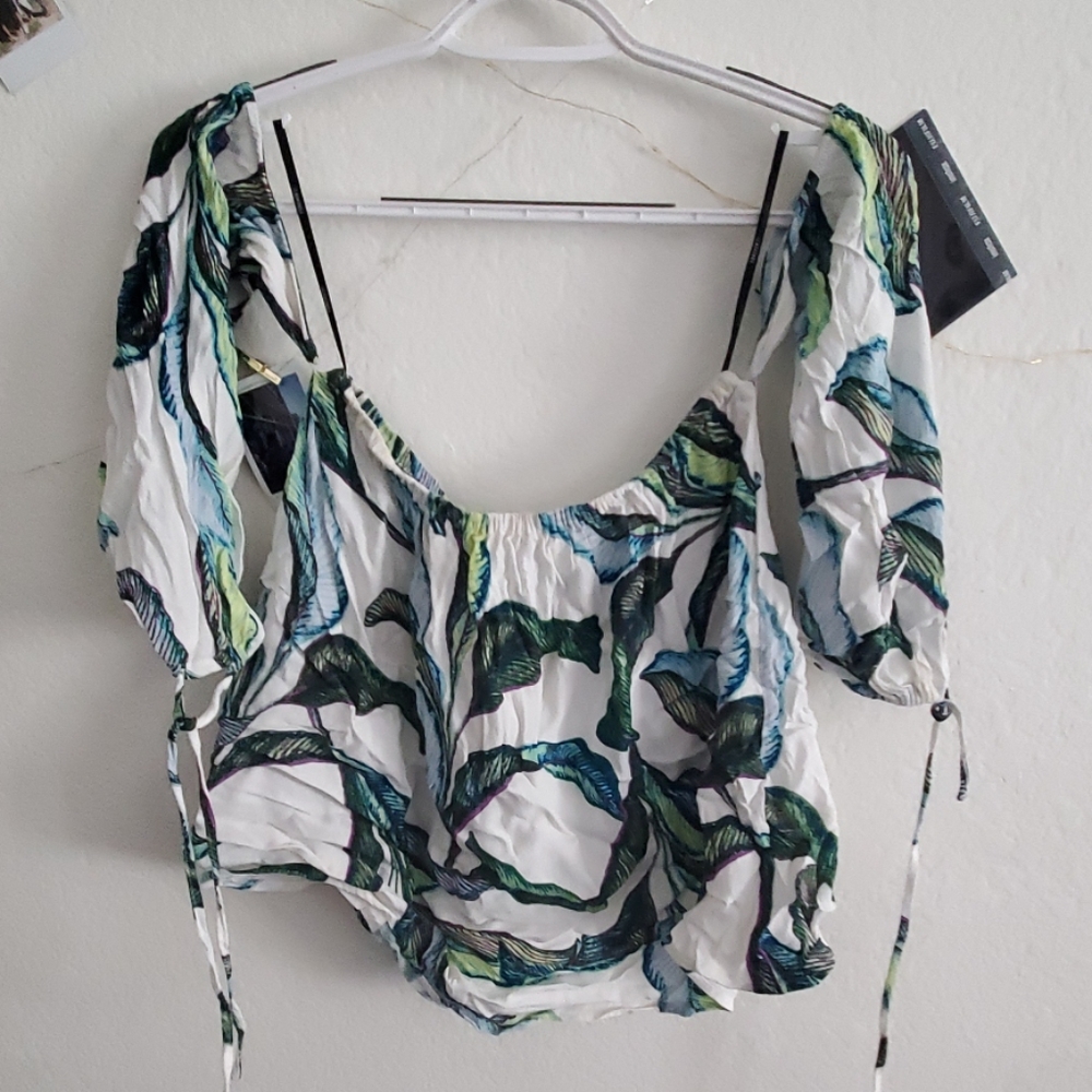 Off the shoulder sleeve shirt.